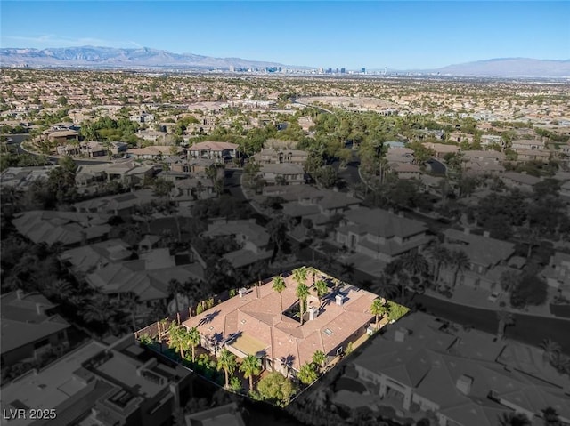 bird's eye view with a mountain view