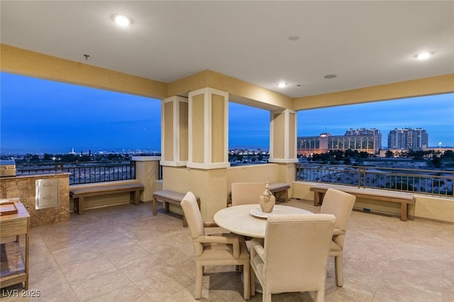 view of patio terrace at dusk