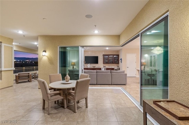 dining space with light tile patterned flooring