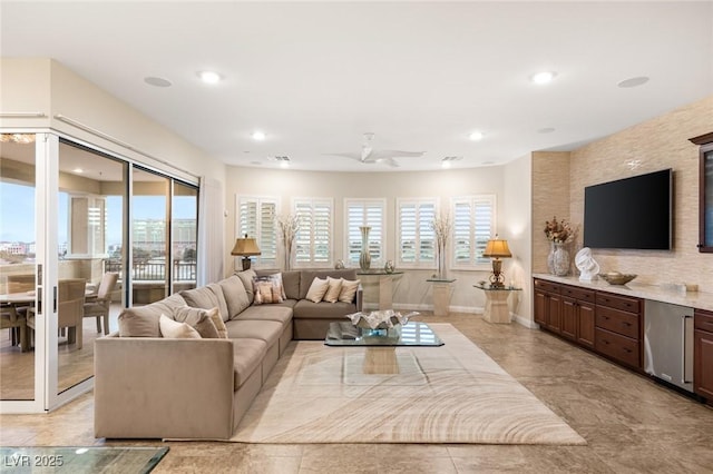 living room with ceiling fan