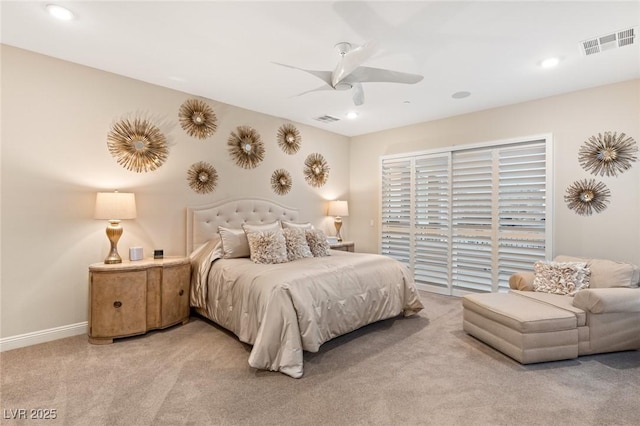 bedroom featuring ceiling fan and light colored carpet