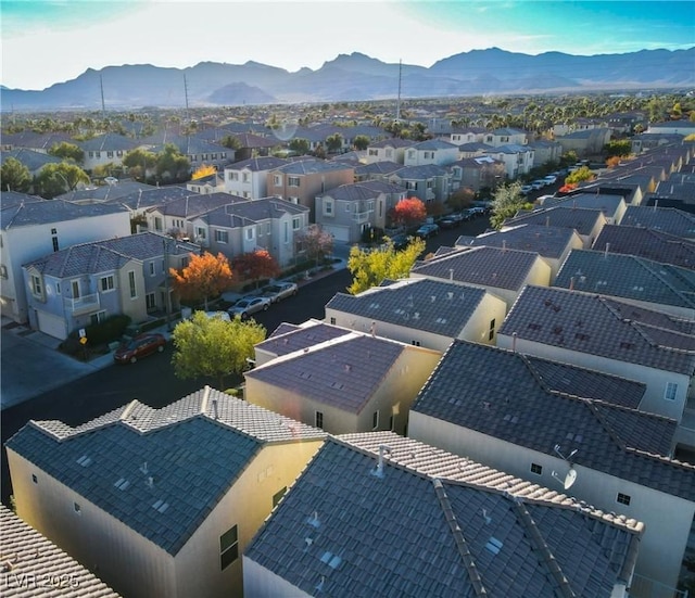 drone / aerial view featuring a mountain view