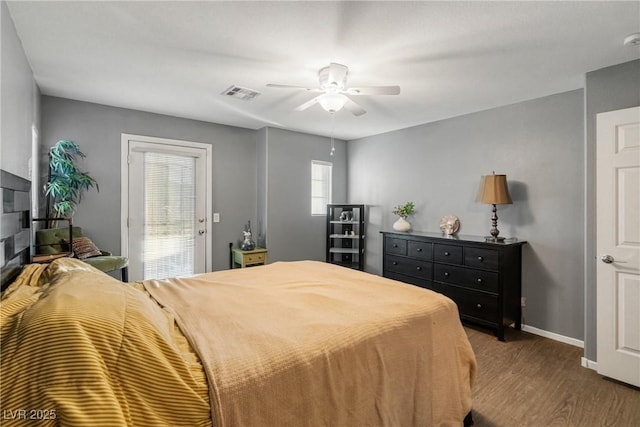 bedroom with hardwood / wood-style flooring and ceiling fan