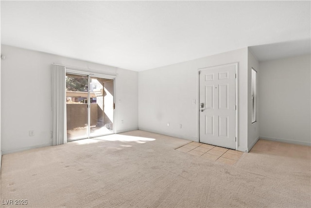 view of carpeted spare room