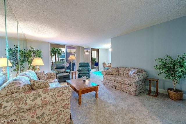 living room with a textured ceiling, carpet floors, and floor to ceiling windows