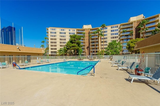 view of swimming pool with a patio area