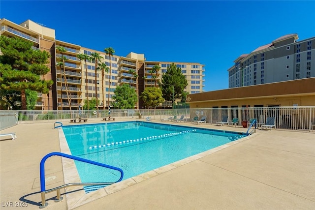 view of swimming pool featuring a patio