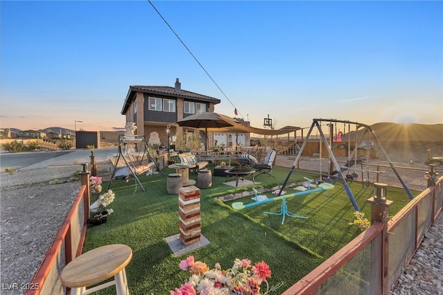 view of jungle gym featuring a yard