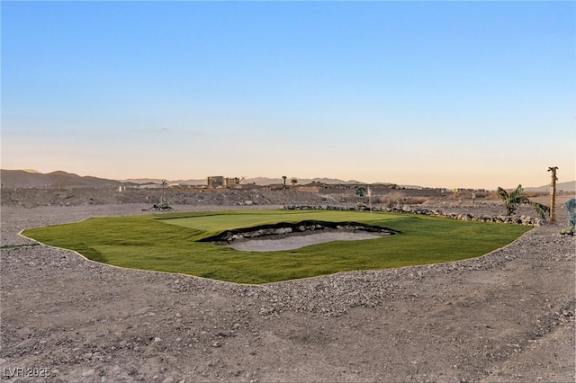 view of home's community featuring a lawn