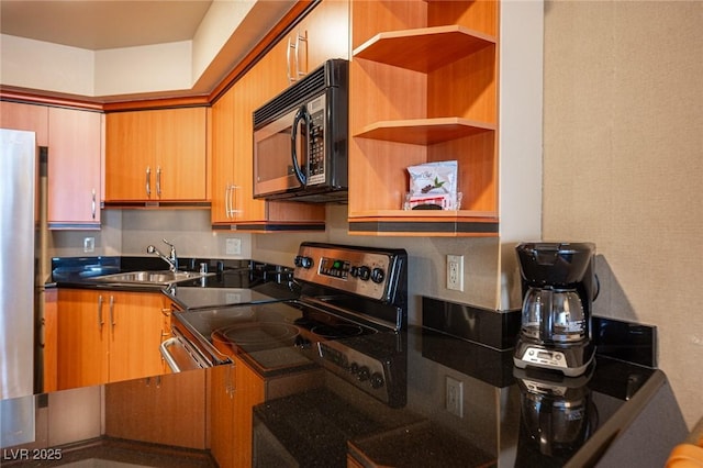 kitchen with sink and appliances with stainless steel finishes