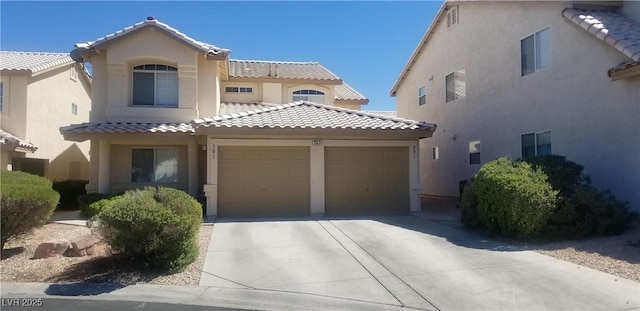 view of front of home with a garage