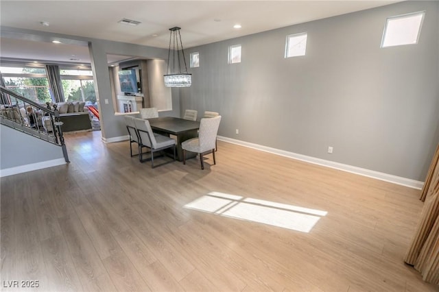 dining area with light wood-type flooring