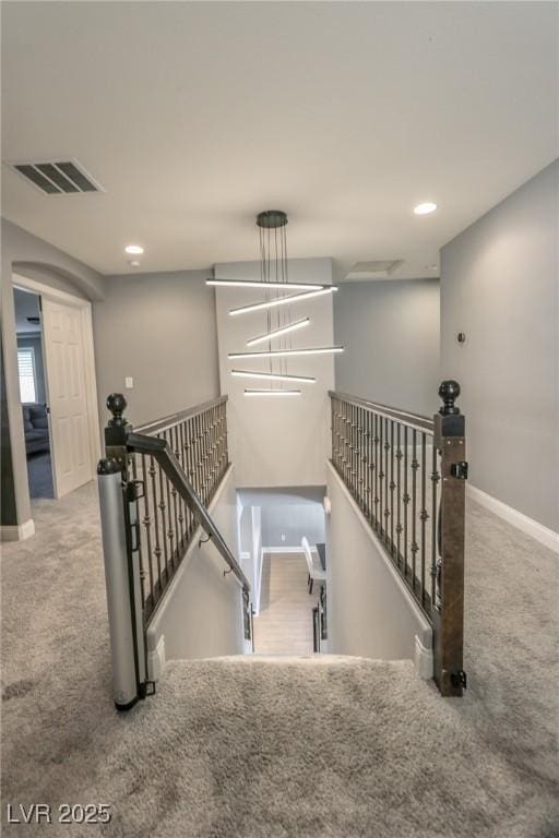 stairway with carpet flooring