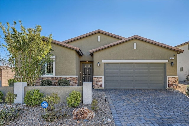 view of front of home with a garage