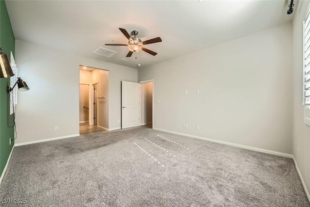 unfurnished bedroom with ceiling fan and carpet flooring