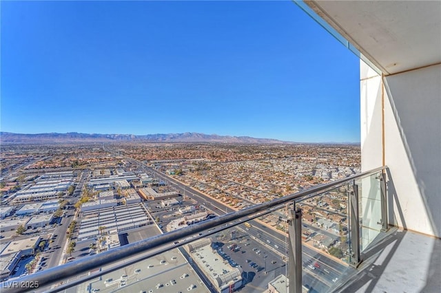 balcony featuring a mountain view