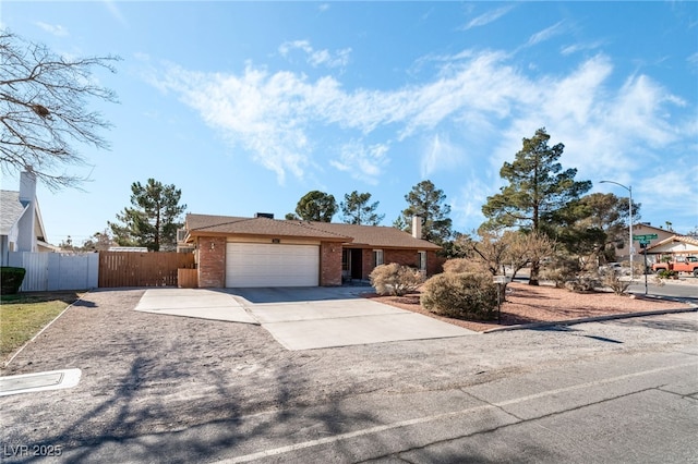 single story home featuring a garage