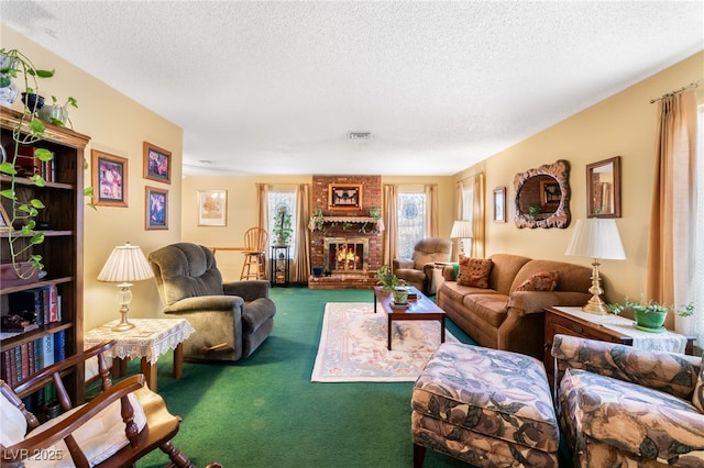 carpeted living room with a fireplace and a textured ceiling