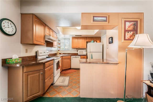 kitchen featuring white appliances and sink