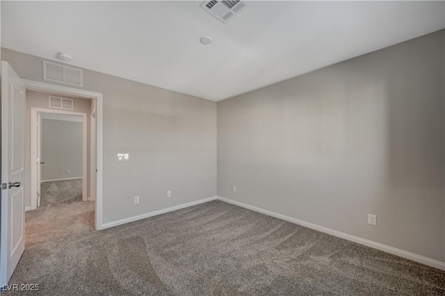 spare room featuring carpet flooring