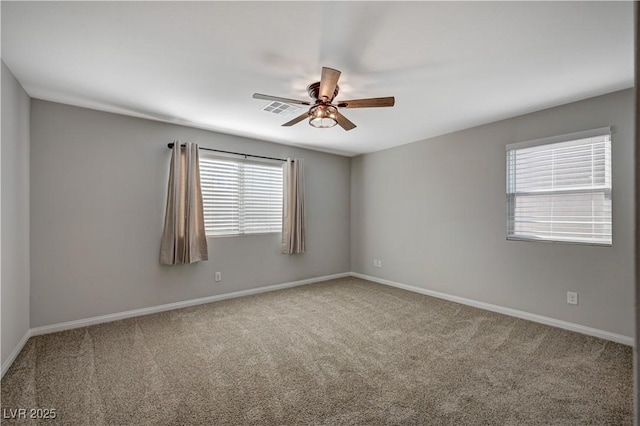 carpeted empty room with ceiling fan