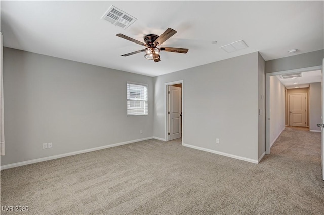 empty room with light carpet and ceiling fan