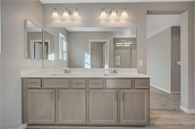 bathroom featuring vanity and wood-type flooring