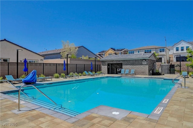 view of pool featuring a patio