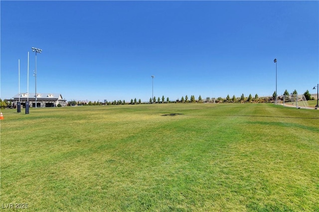 view of home's community with a lawn