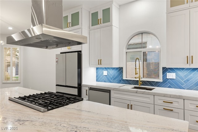 kitchen with white cabinetry, island exhaust hood, and appliances with stainless steel finishes