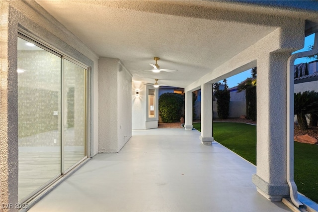 view of patio / terrace featuring ceiling fan