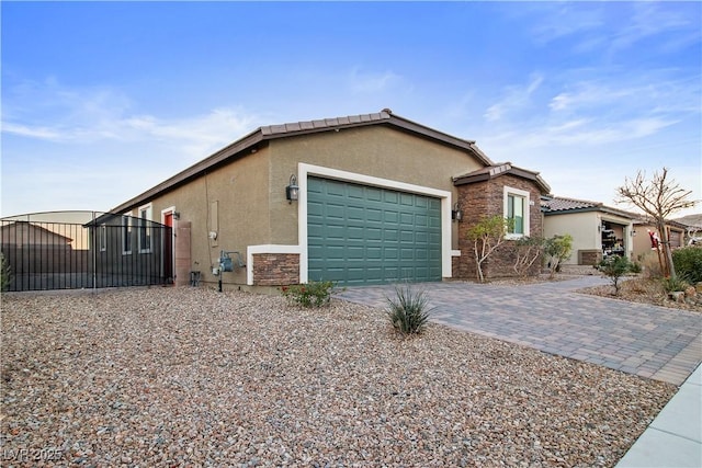 view of side of property featuring a garage