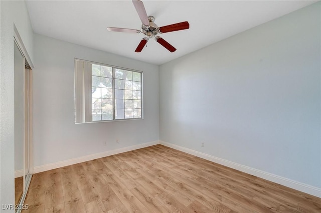 1701 King James St Unit 101, Las Vegas, NV 89144 - spare room featuring light wood-style floors, baseboards, and ceiling fan