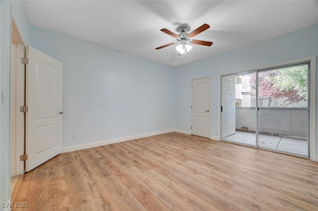 1701 King James St Unit 101, Las Vegas, NV 89144 - spare room featuring light wood finished floors, ceiling fan, and baseboards