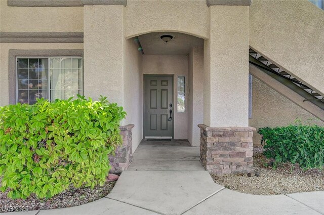 1701 King James St Unit 101, Las Vegas, NV 89144 - doorway to property featuring stucco siding