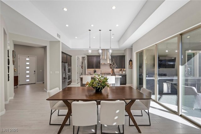 dining space featuring light hardwood / wood-style flooring