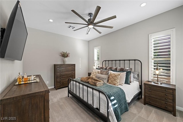 carpeted bedroom featuring ceiling fan