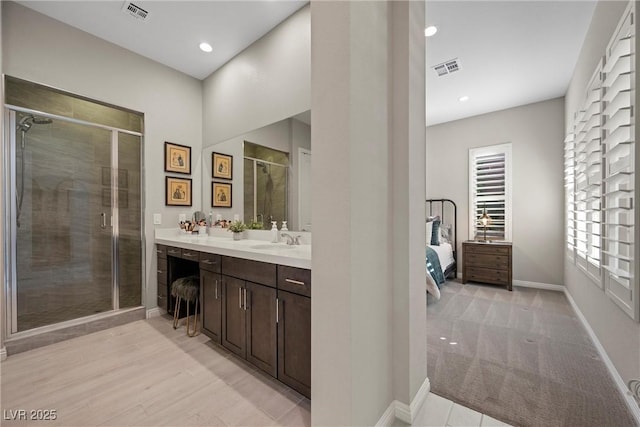 bathroom featuring vanity and walk in shower