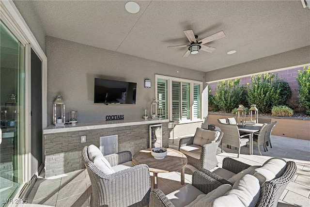 view of patio with an outdoor hangout area and ceiling fan