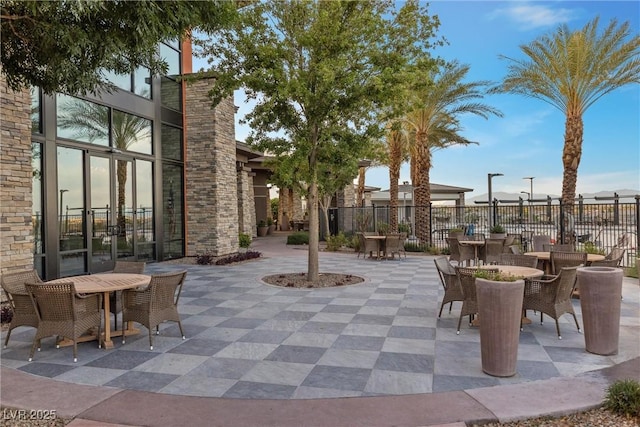 view of patio terrace at dusk