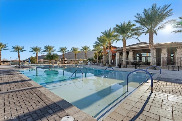 view of pool featuring a patio area