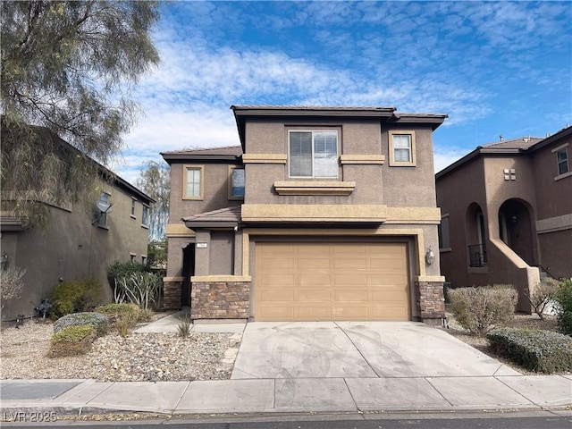 view of front of property with a garage