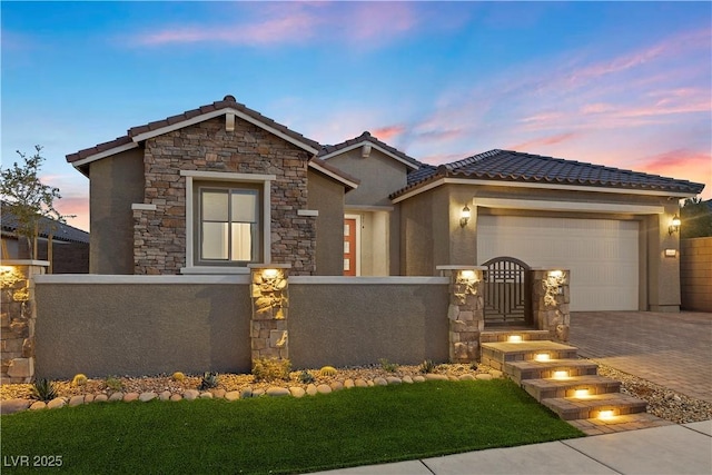 view of front of home featuring a garage