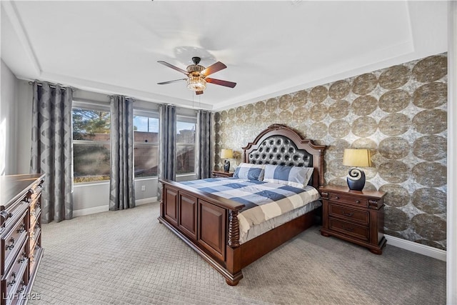 bedroom featuring ceiling fan and light colored carpet