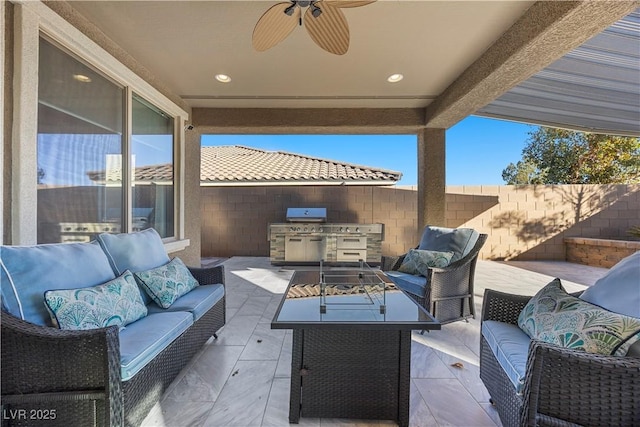 view of patio with exterior kitchen and an outdoor hangout area