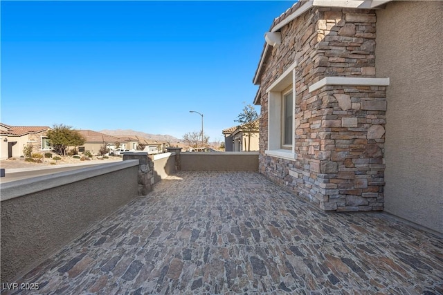 view of patio with a mountain view