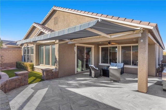 rear view of property with a patio area