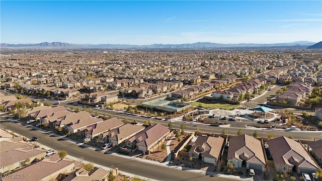 birds eye view of property featuring a mountain view