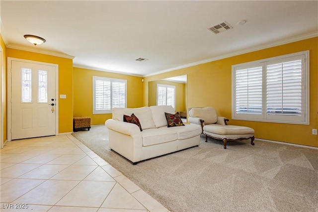 living room with light tile patterned floors and ornamental molding