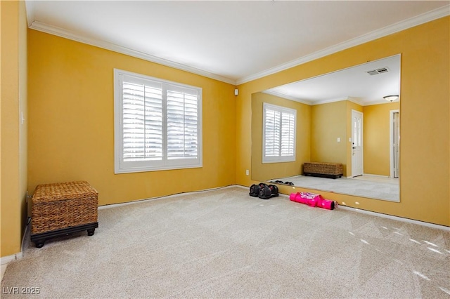 unfurnished room with carpet floors and ornamental molding